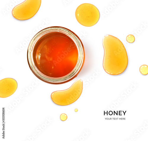 Creative layout made of honey on the white background. Flat lay. Food concept. Macro concept.