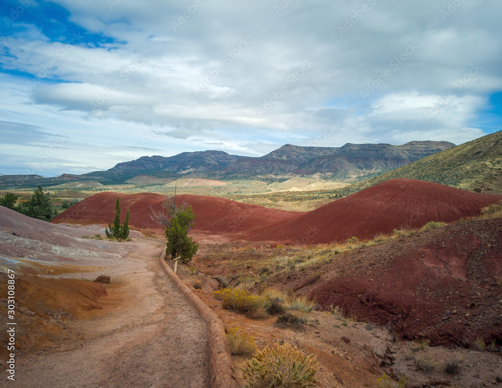 Brilliantly colored hills and riverbeds from the scenic Painted Cove Trail at the John Day Fossil Beds in Mitchell Oregon
