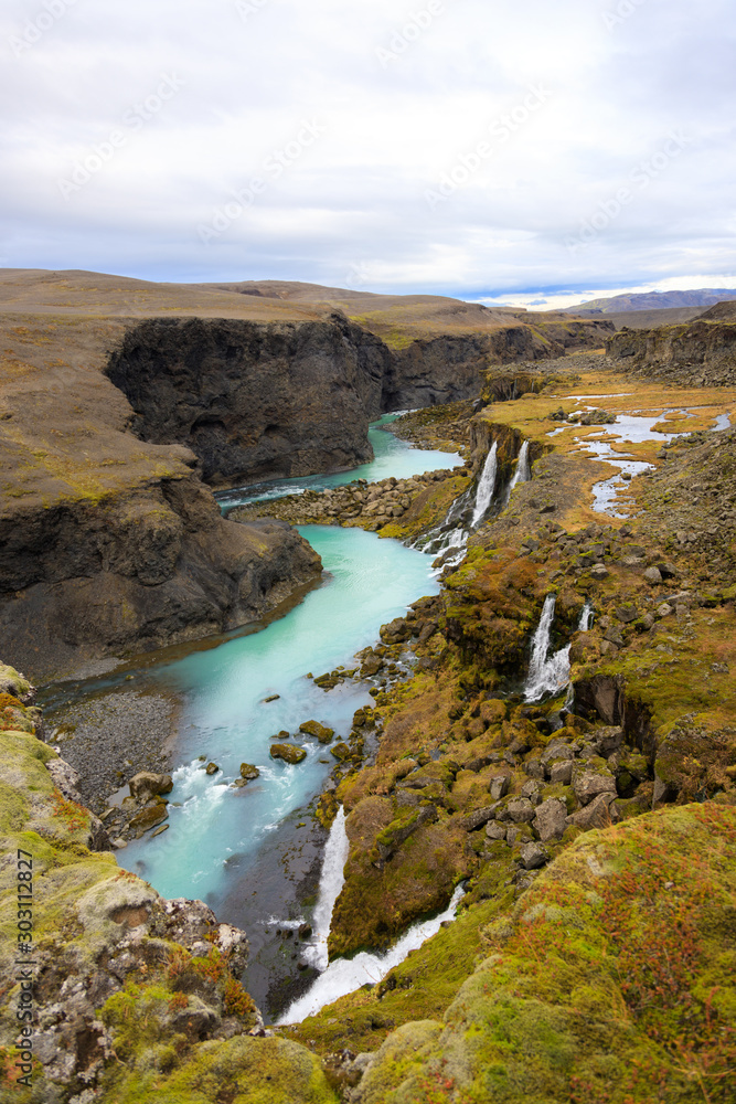 Beautiful landscape of Sigoldugljufur canyon with many small waterfalls and the blue river in Highlands of Iceland Beautiful landscape of Sigoldugljufur canyon with many small waterfalls and the blue river in Highlands of Iceland