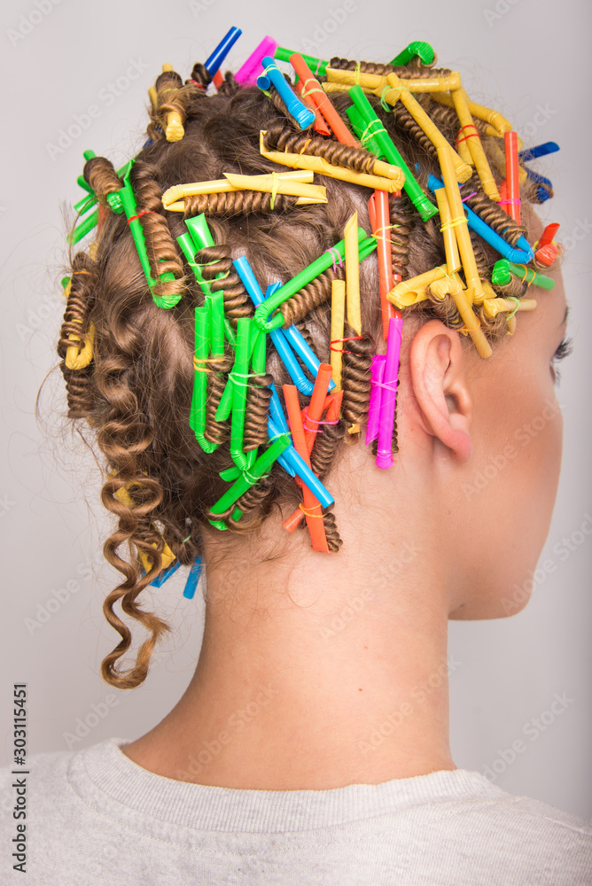 DIY curly hair how to make Afro hairstyle with plastic straw, little curly,  women, blond model Stock Photo | Adobe Stock