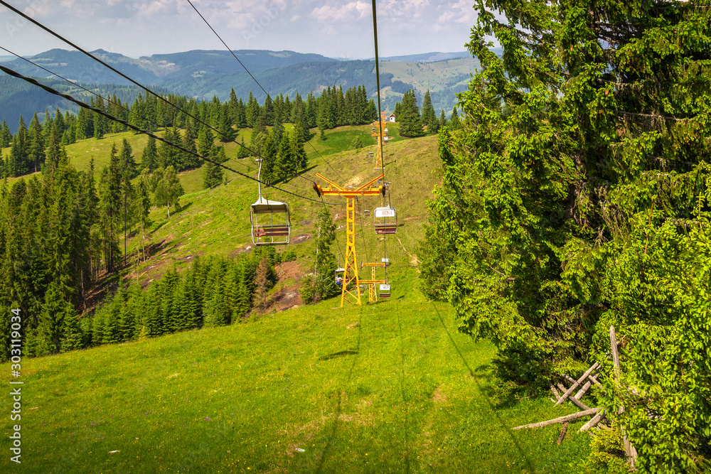 Chairlift route from Vatra Dornei, Romania, passing through montains