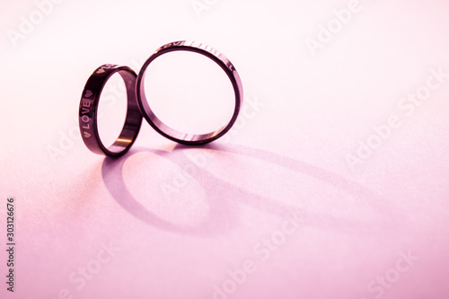 Wedding love rings background. Abstract two ring marriage for backdrop art work design. 