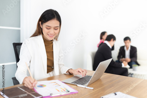 smart asian officer write report on paper, she sitting and feeling happy in work time, strategy analyze and information data research, happiness organization