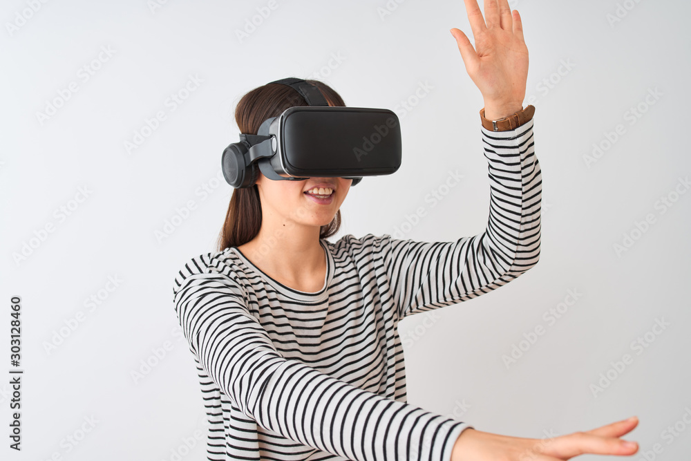 Young beautiful chinese woman playing virtual reality game using goggles Young beautiful chinese woman playing virtual reality game using goggles