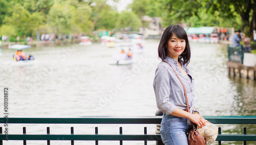 Canvas Print Thai woman wearing a T-shirt and jeans