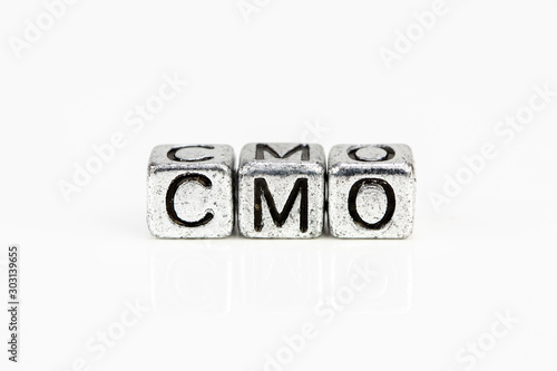 Chief Marketing Officer CMO concept with cubic metal letters photo