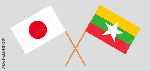 Crossed flags of Myanmar and Japan