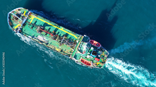 Aerial top view photo of industrial gas and petrol tanker cruising in Mediterranean bay © aerial-drone