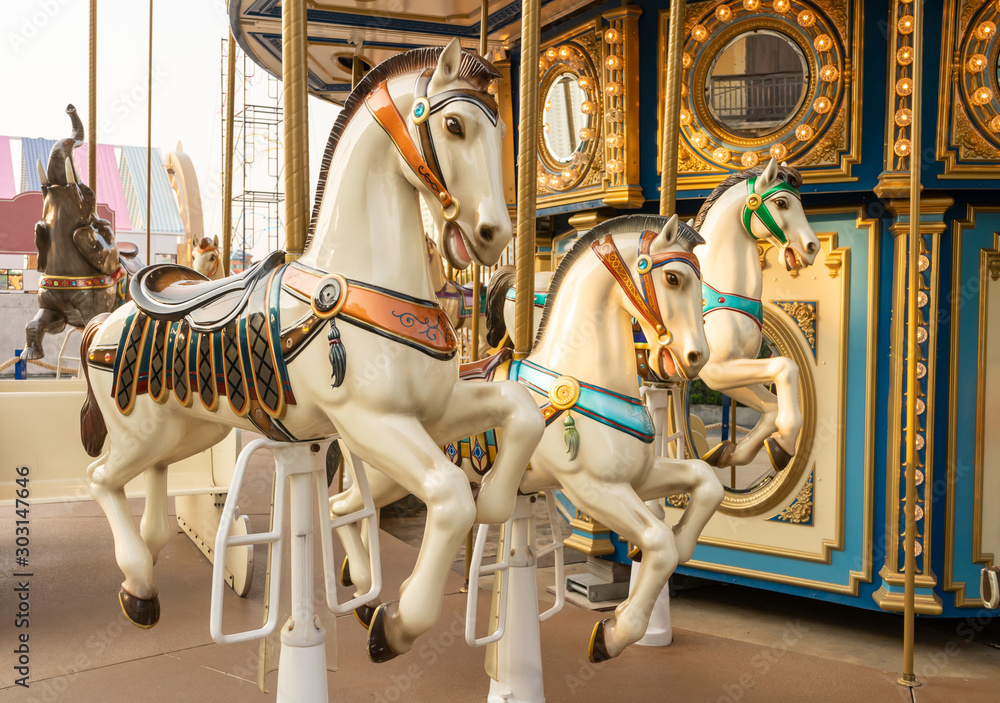 Carousel in a cute amusement park for children.
