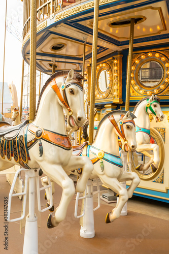 Carousel in a cute amusement park for children.