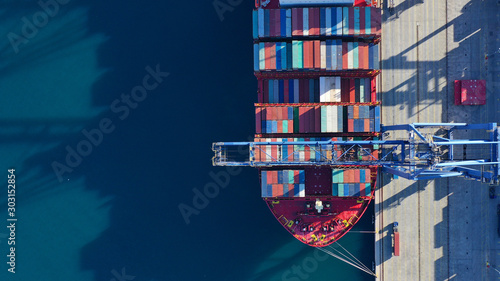 Fotografering Aerial top down photo of industrial cargo container logistics terminal port with