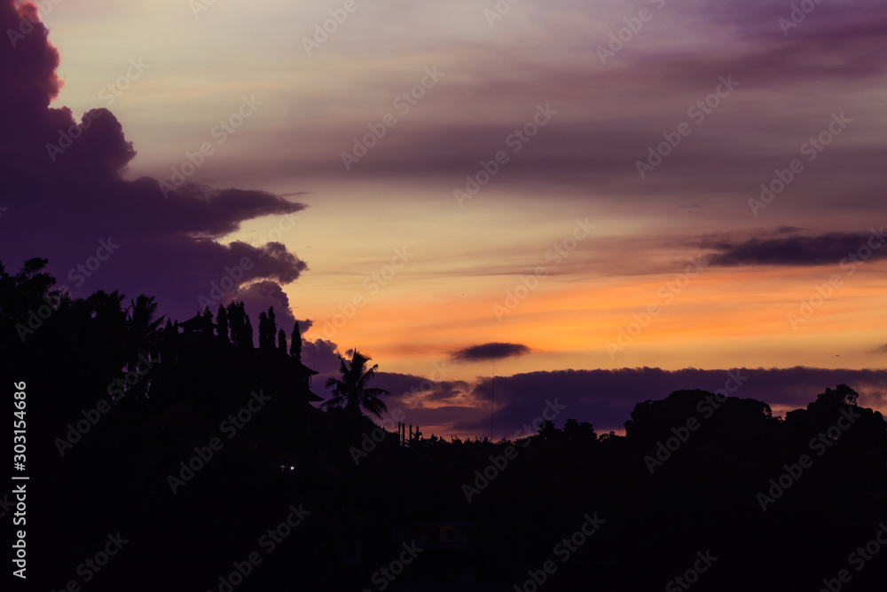 Fototapeta premium Dramatic sky sunrise in Ubud, Bali, Indonesia. Vivid colors scenery.