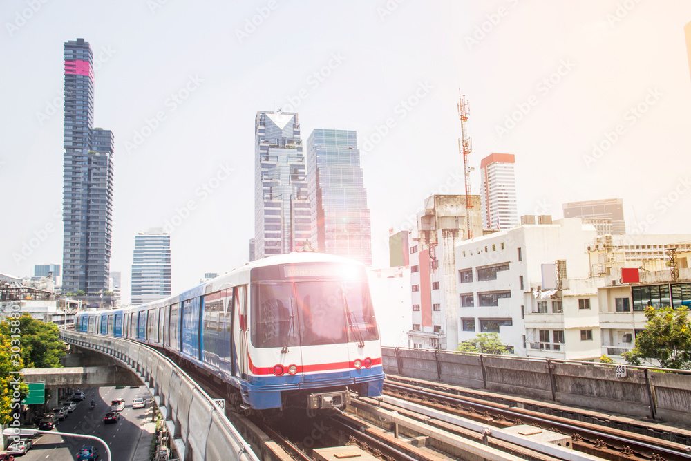 Fototapeta premium Traveling by morning train in Bangkok, Thailand