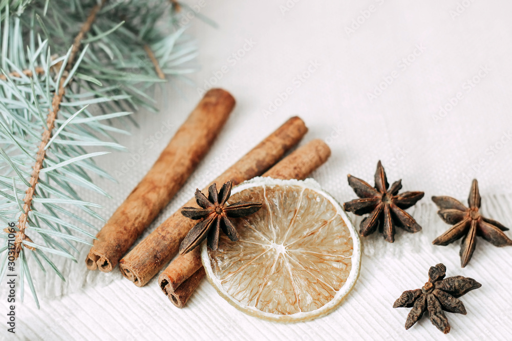 spices for Christmas baking and drinks: dried lime, cinnamon and ginger spices for Christmas baking and drinks: dried lime, cinnamon and ginger