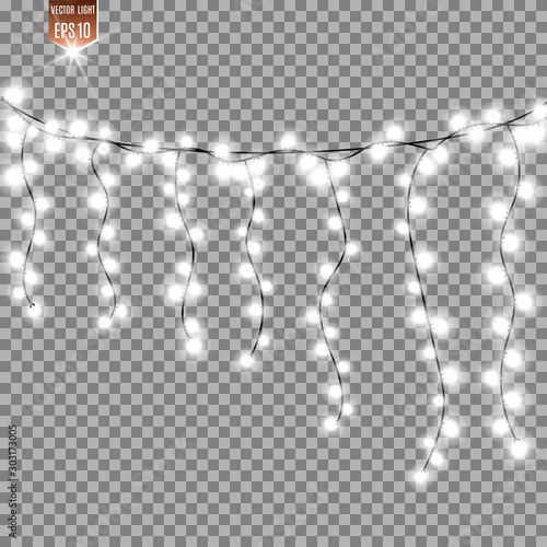 Christmas bright, beautiful lights, design elements. Glowing lights for design of Xmas greeting cards. Garlands, light Christmas decorations.