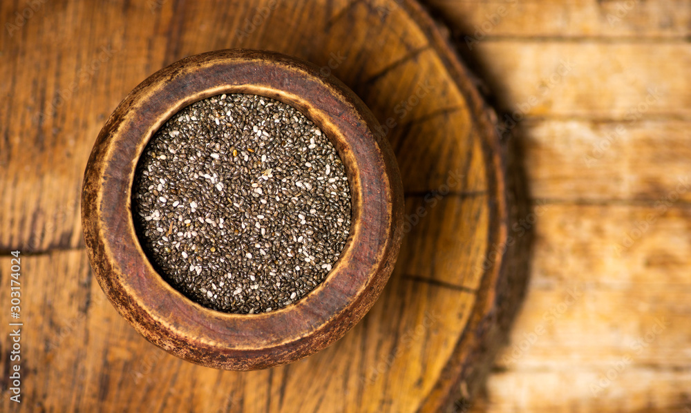 Chia seeds in a bowl top view Chia seeds in a bowl top view