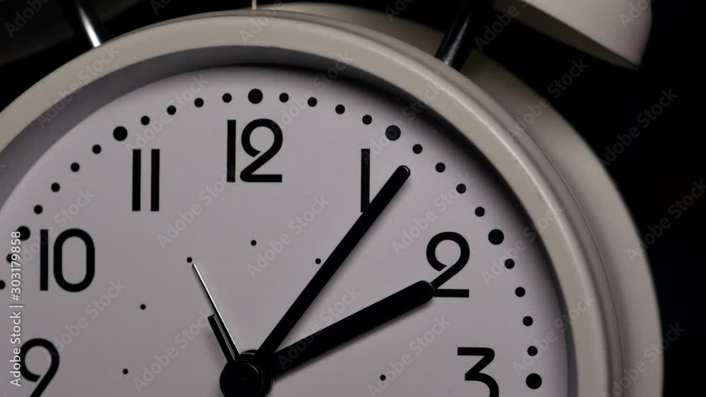 The White Clock With Black Arrows Shows The Time Two Hours Timelapse. The White Clock With Black Arrows Shows The Time Two Hours Timelapse.