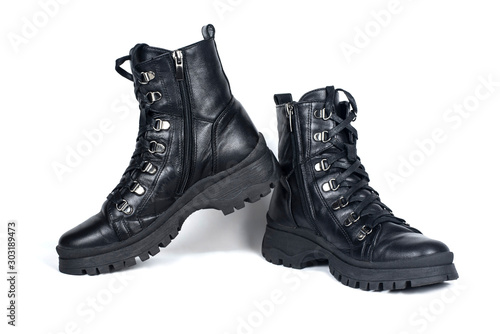 Dark winter shoes for boys and girls on a light background. All teens like this shoe