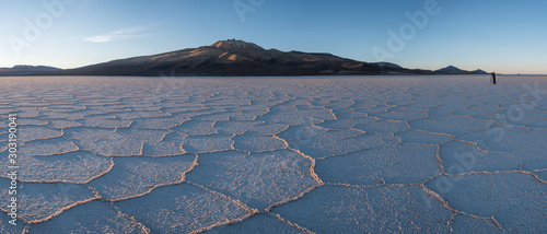 Photographer in salt desert photo