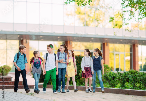 Group of kids going to school together.