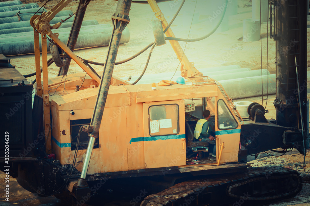 construction crews to work on high ground heavy industry and safety concept over blurred natural background sunset construction crews to work on high ground heavy industry and safety concept over blurred natural background sunset