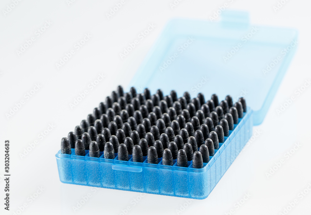 Hunting cartridges in a plastic box. Bullet storage box.
