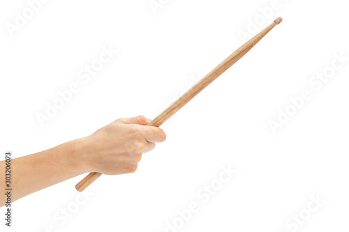 Woman's hand holding drum stick isolated on white background.