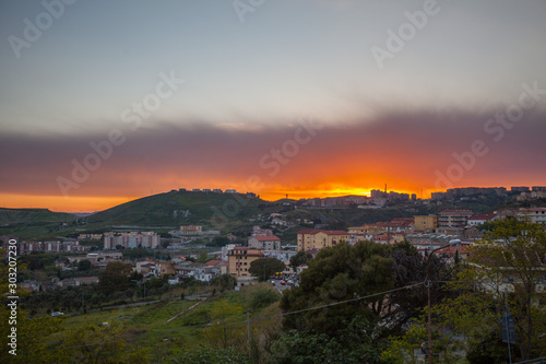 Catanzaro city in calabria, Italy with burning sky at sunset 