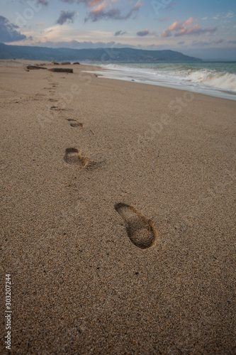 Foot prints at a beach in southern Italy
