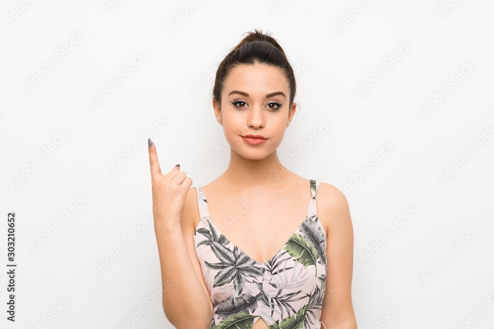 Young woman over isolated white background pointing with the index finger a great idea Young woman over isolated white background pointing with the index finger a great idea