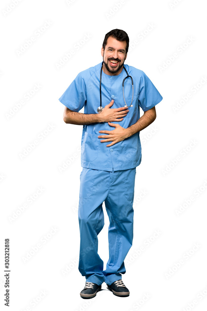 Full-length shot of Surgeon doctor man smiling a lot over isolated white background Full-length shot of Surgeon doctor man smiling a lot over isolated white background
