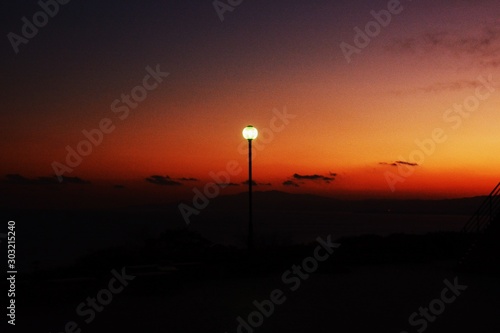 Abstract background material / The mysterious harmony of sunset and streetlight.