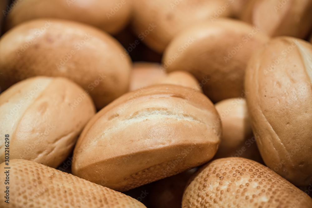 Fresh bread on the counter in the store, close-up . Fresh bread on the counter in the store, close-up .