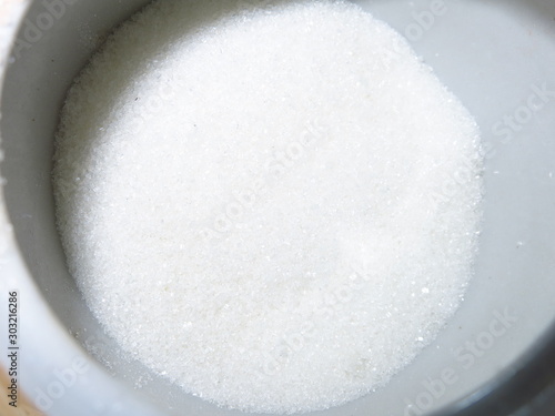white sugar in a sugar bowl