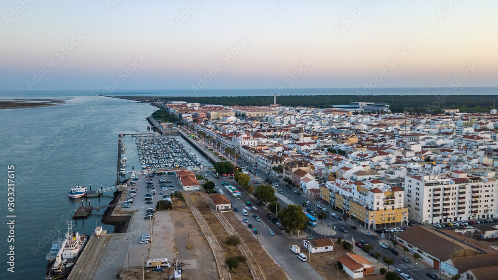 Aerial. Vila Real Santo Antonio on the river Guadiana, with a port for yachts and fishing boats. Aerial. Vila Real Santo Antonio on the river Guadiana, with a port for yachts and fishing boats.