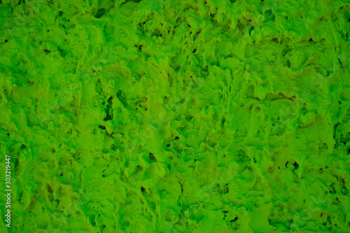 Bright green background close-up.