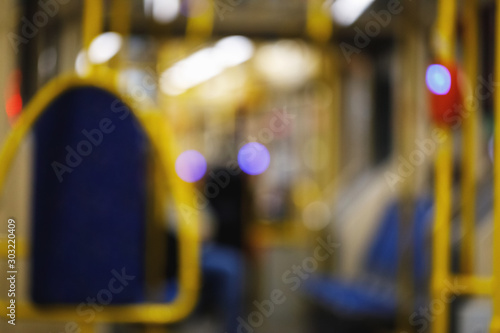 public transport background in defocus. interior of a tram or bus in the form of a backdrop