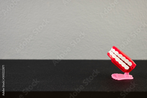 Fotografie Comic toy tooth. To promote dental health to people