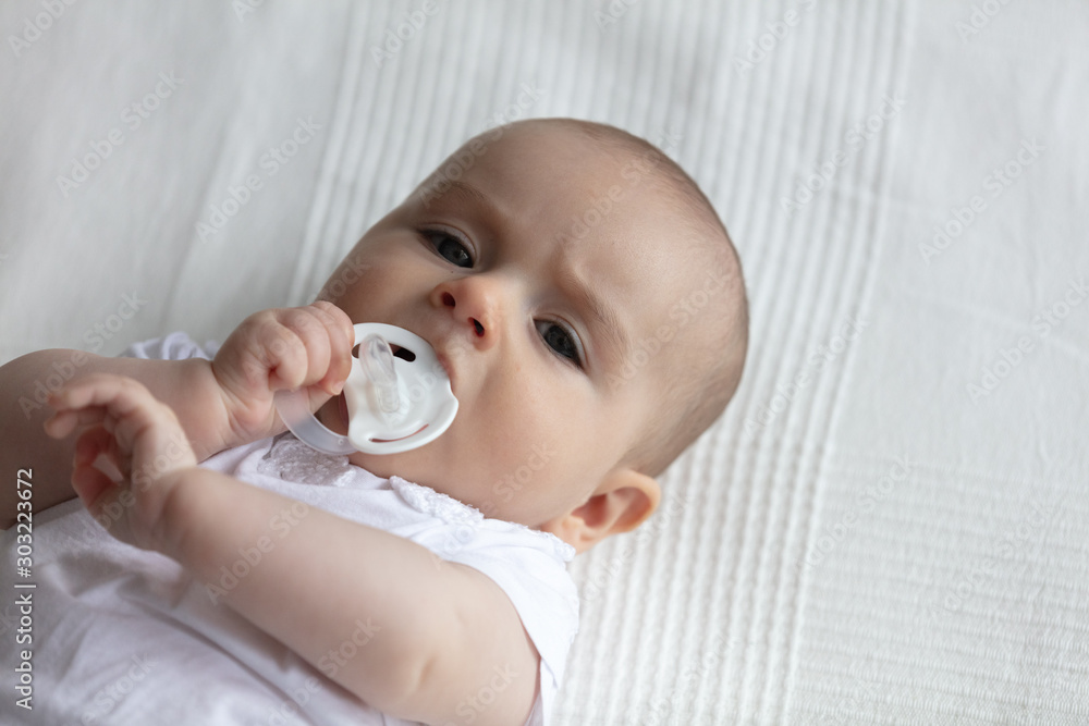Baby sales biting pacifier