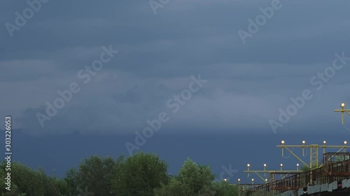 plane landing at runway. mountains and cloud on a background photo