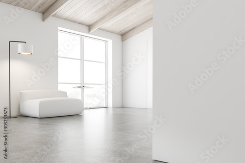 Attic living room corner with armchair