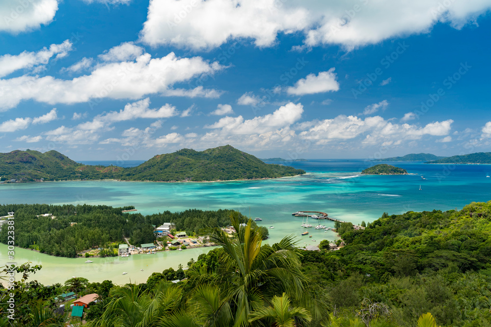 Scenic landscape view from top of fond ferdinand nature reserve in Praslin on Bay of St. Anne. Amazing views of Seychelles and Indian Ocean.