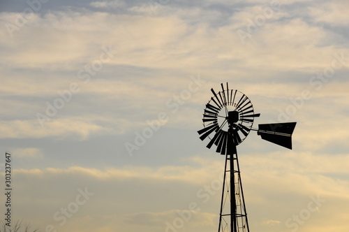 Rural Windmill in Cloudy Sky and Broken Blades