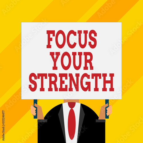 Conceptual hand writing showing Focus Your Strength. Concept meaning Improve skills work on weakness points think more Just man chest dressed dark suit tie holding big rectangle