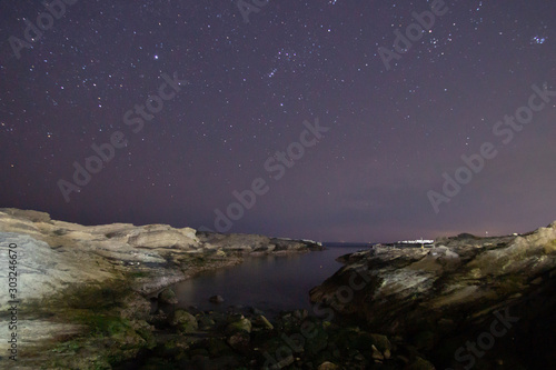 The starry sky seen on the coast © Photo_by_Tomo