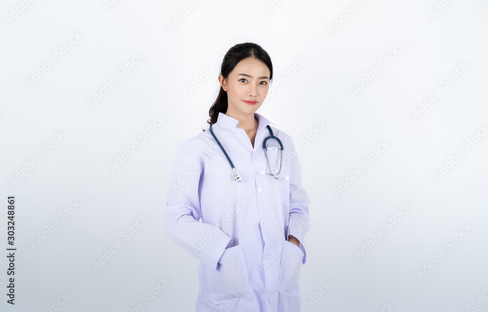 Fototapeta premium Doctor wearing white gown with a stethoscope on her neck.
