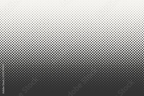 Vector halftone dots background. Black and white comic pattern. photo