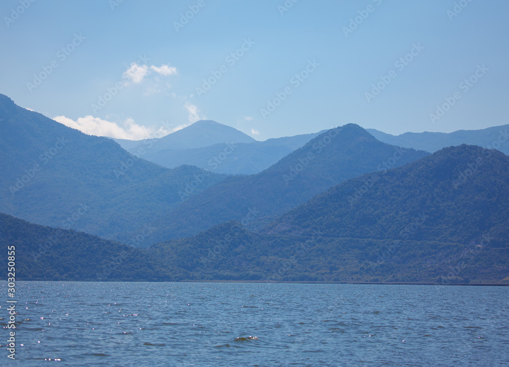 blue scenery with mountains and sea bay 