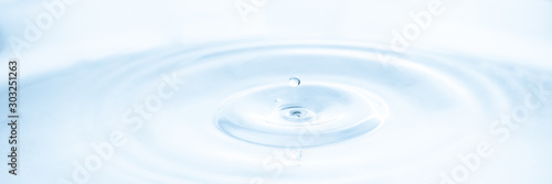 Water drop splash with ripples