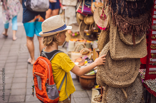 Fotografie Boy at a market in Ubud, Bali